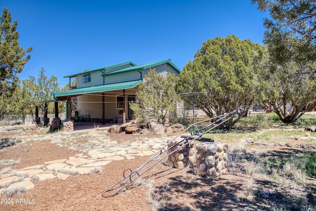 8455 Ridge Dr, Show Low, AZ 85901 - back of house featuring a patio