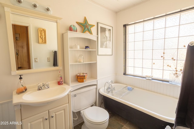 8455 Ridge Dr, Show Low, AZ 85901 - full bath featuring a soaking tub, vanity, a wainscoted wall, toilet, and radiator heating unit