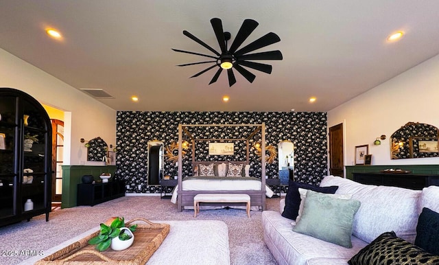 bedroom featuring recessed lighting, visible vents, an accent wall, and carpet floors