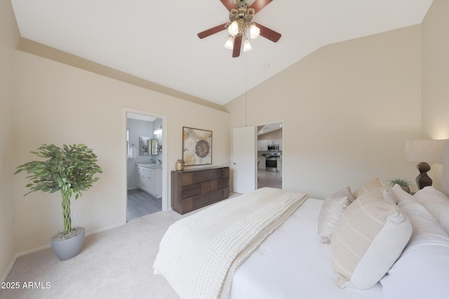 2627 E Gary Way, Phoenix, AZ 85042 - bedroom featuring vaulted ceiling, light colored carpet, baseboards, ensuite bath, and ceiling fan