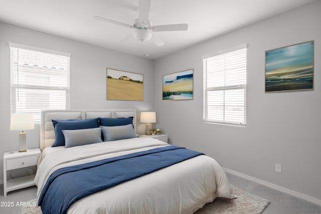 bedroom featuring baseboards and a ceiling fan