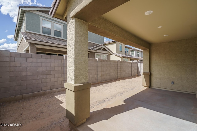 view of patio with fence