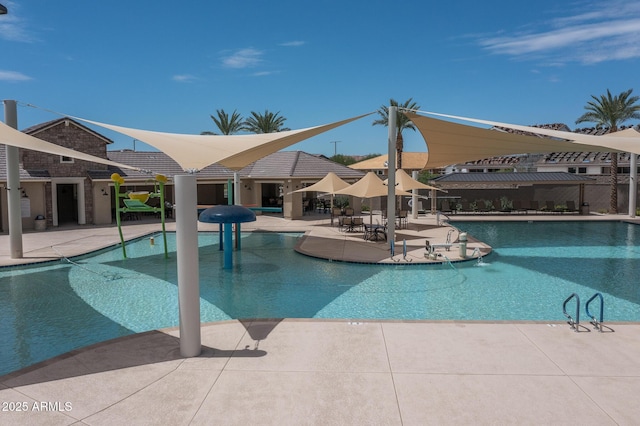 community pool with a patio