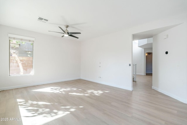 4389 E Muirfield St, Gilbert, AZ 85298 - spare room with baseboards, visible vents, light wood-type flooring, and a ceiling fan