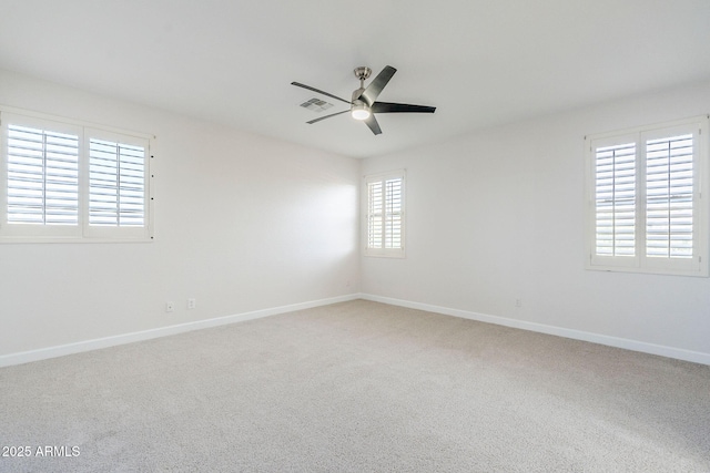4389 E Muirfield St, Gilbert, AZ 85298 - carpeted spare room featuring visible vents, ceiling fan, and baseboards