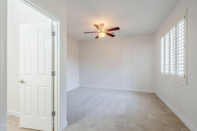4389 E Muirfield St, Gilbert, AZ 85298 - unfurnished room with baseboards, light colored carpet, a ceiling fan, and a healthy amount of sunlight