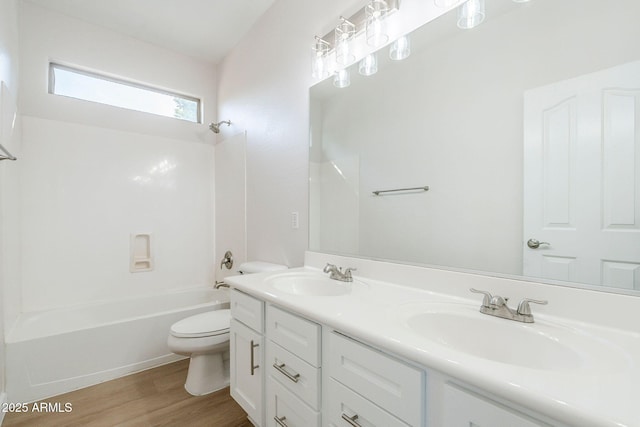 4389 E Muirfield St, Gilbert, AZ 85298 - bathroom with shower / bathtub combination, a sink, toilet, and wood finished floors