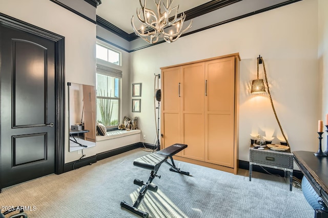 28609 N Cottonwood Basin Dr, Rio Verde, AZ 85263 - workout area featuring carpet flooring, a chandelier, ornamental molding, and a towering ceiling