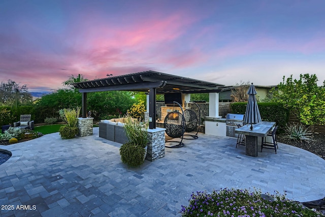 28609 N Cottonwood Basin Dr, Rio Verde, AZ 85263 - view of patio / terrace featuring exterior kitchen and an outdoor living space with a fireplace