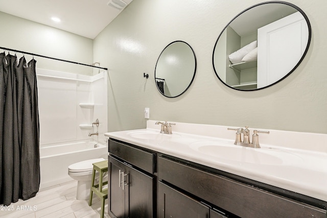 bathroom with a sink, visible vents, shower / bathtub combination with curtain, and toilet