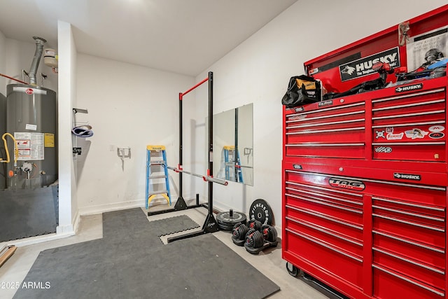 exercise room featuring water heater