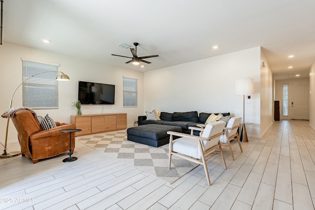 living room featuring visible vents, recessed lighting, light wood-type flooring, and ceiling fan