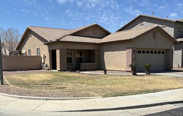 12505 W Adams St, Avondale, AZ 85323 - view of front of property with stucco siding, an attached garage, driveway, and a tile roof