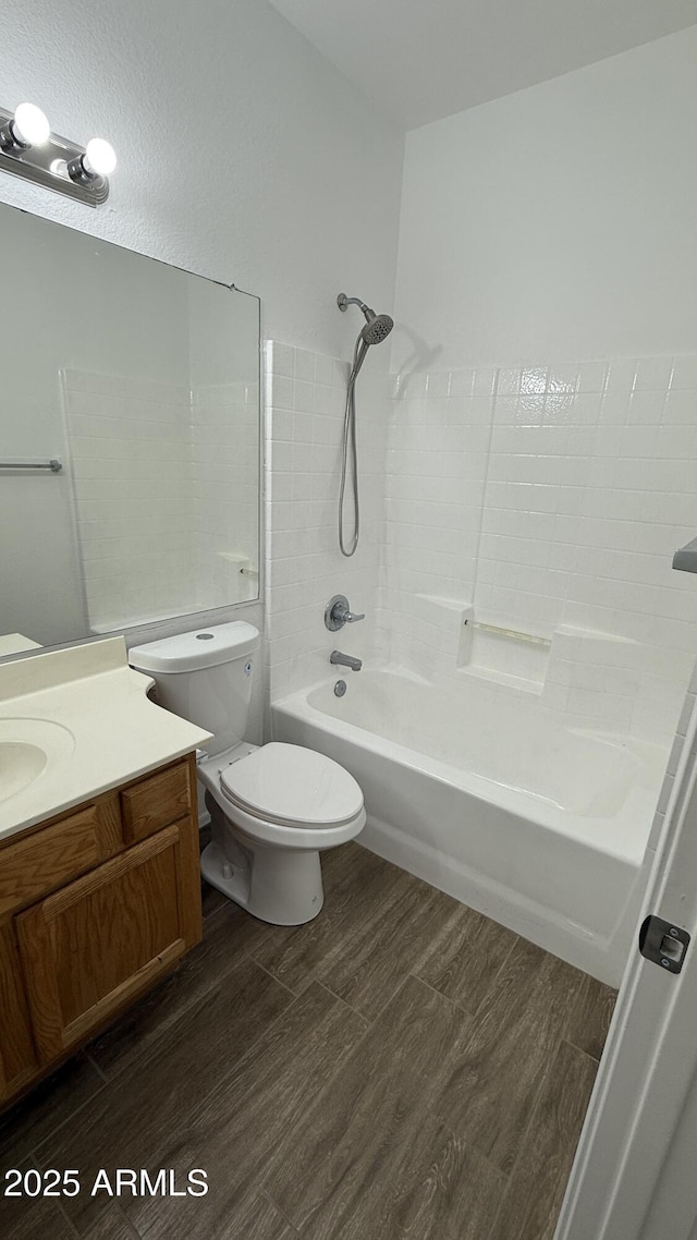 12505 W Adams St, Avondale, AZ 85323 - bathroom with vanity,  shower combination, and wood finished floors