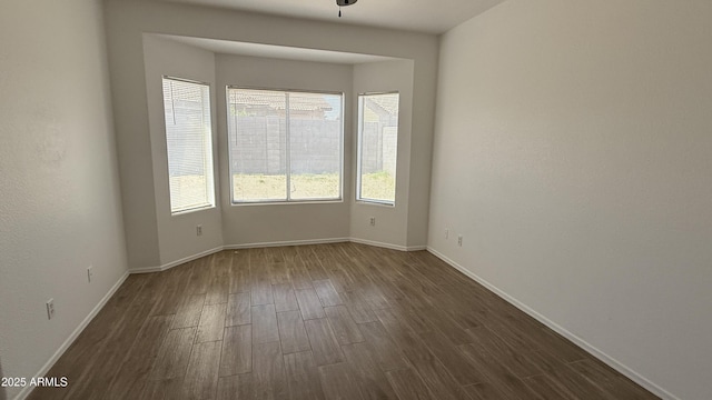 12505 W Adams St, Avondale, AZ 85323 - unfurnished room featuring dark wood-style flooring