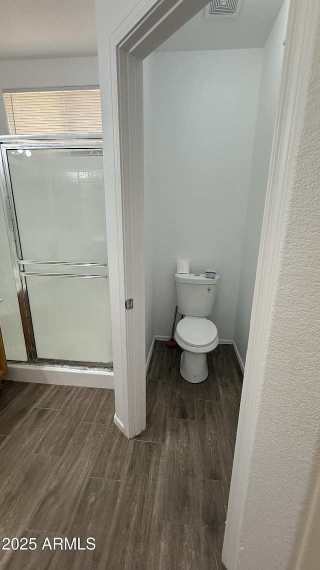 12505 W Adams St, Avondale, AZ 85323 - full bath with wood finished floors and a stall shower