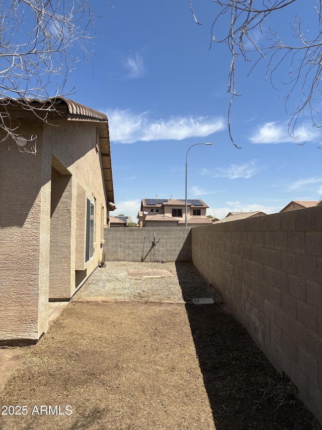 12505 W Adams St, Avondale, AZ 85323 - fenced backyard with a patio