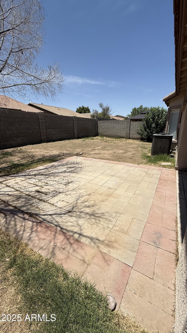 12505 W Adams St, Avondale, AZ 85323 - fenced backyard with a patio area