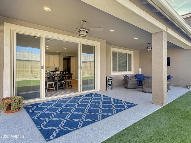 view of patio / terrace featuring a ceiling fan