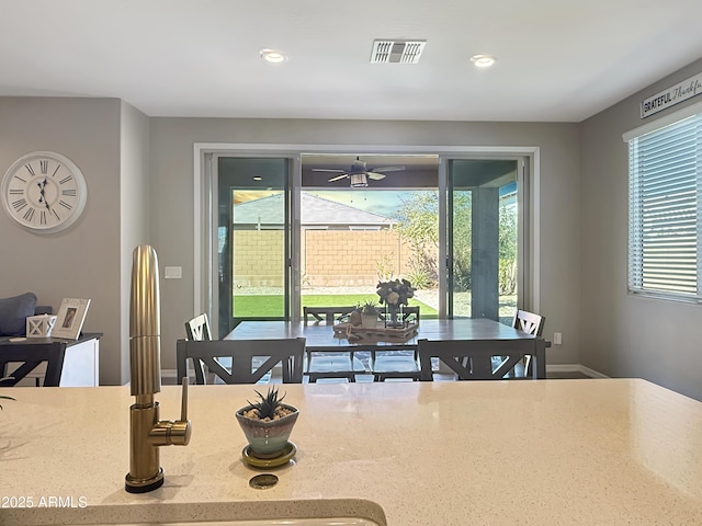 dining room with recessed lighting, visible vents, baseboards, and ceiling fan