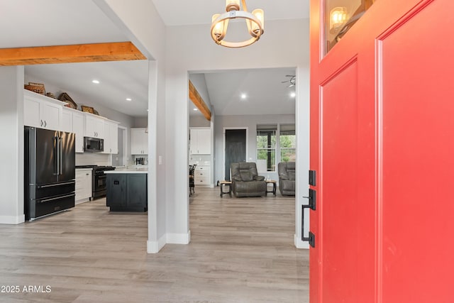 1305 N 22nd Ave, Show Low, AZ 85901 - foyer entrance with beam ceiling, light wood-style flooring, baseboards, a chandelier, and recessed lighting