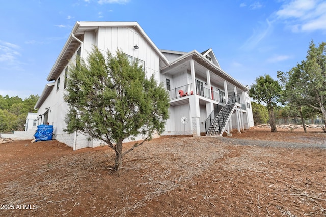 1305 N 22nd Ave, Show Low, AZ 85901 - view of home's exterior featuring stairway and a porch