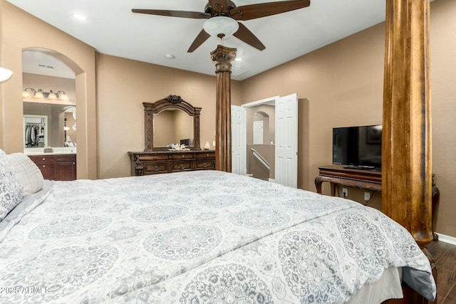bedroom with ceiling fan, visible vents, recessed lighting, dark wood finished floors, and ensuite bath