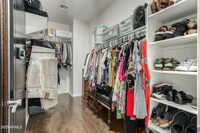 spacious closet with visible vents and wood finished floors