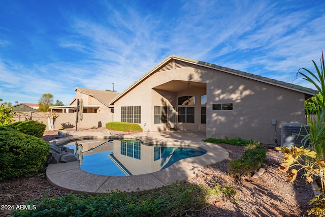 view of swimming pool with a patio and central AC unit