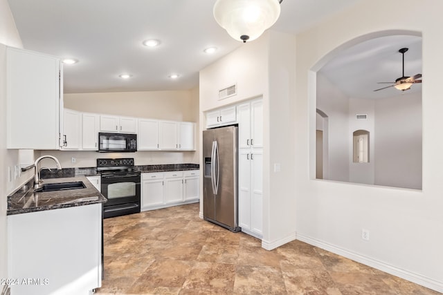 kitchen with ceiling fan, sink, black appliances, white cabinets, and lofted ceiling