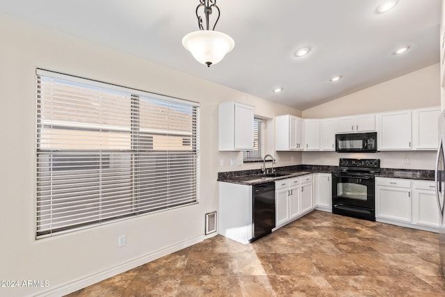 kitchen with sink, pendant lighting, lofted ceiling, white cabinets, and black appliances