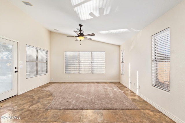 interior space with ceiling fan and vaulted ceiling