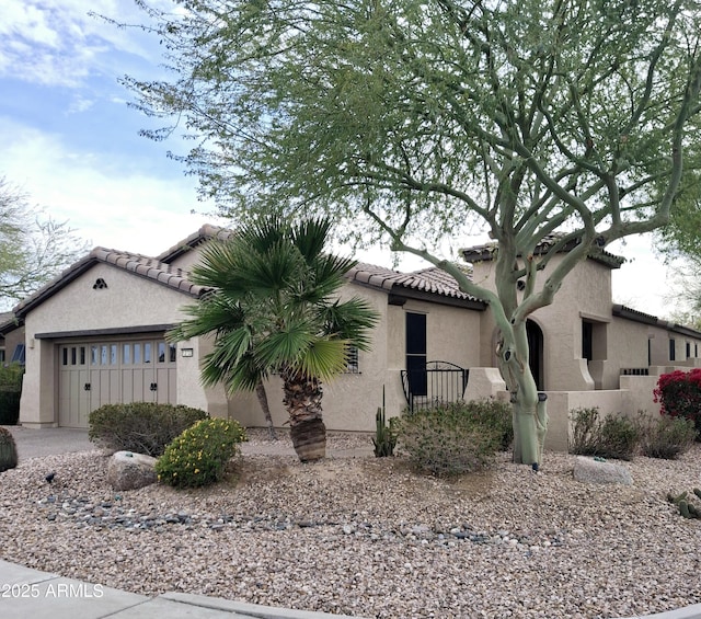 view of front of home with a garage