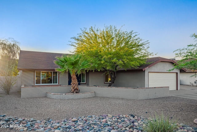 view of front of home featuring a garage