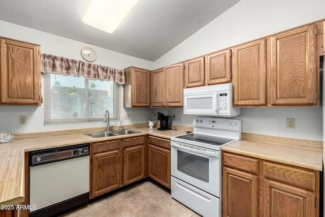 6424 E Aire Libre Ln, Scottsdale, AZ 85254 - kitchen with white appliances, a sink, vaulted ceiling, light countertops, and light tile patterned flooring