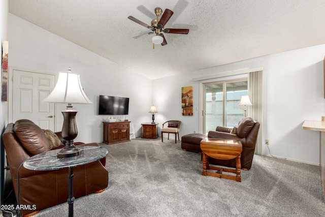 6424 E Aire Libre Ln, Scottsdale, AZ 85254 - carpeted living room with vaulted ceiling, ceiling fan, and a textured ceiling