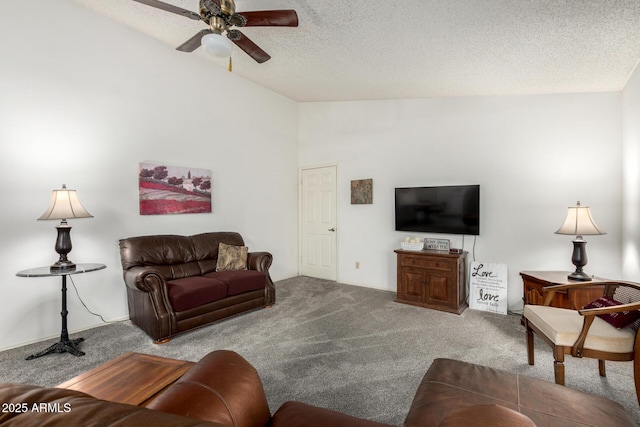 6424 E Aire Libre Ln, Scottsdale, AZ 85254 - carpeted living room featuring ceiling fan, lofted ceiling, and a textured ceiling