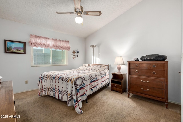 6424 E Aire Libre Ln, Scottsdale, AZ 85254 - bedroom with light colored carpet, a textured ceiling, vaulted ceiling, and a ceiling fan