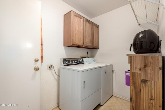 6424 E Aire Libre Ln, Scottsdale, AZ 85254 - laundry area with washing machine and clothes dryer, cabinet space, and baseboards