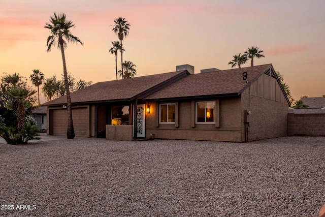 6424 E Aire Libre Ln, Scottsdale, AZ 85254 - view of front of property featuring an attached garage and driveway