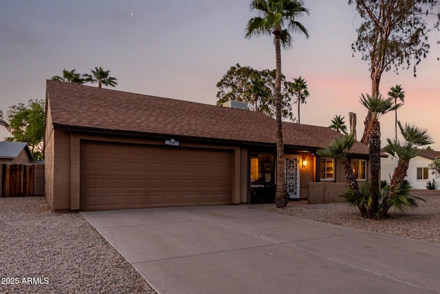 6424 E Aire Libre Ln, Scottsdale, AZ 85254 - single story home featuring a garage, concrete driveway, and roof with shingles