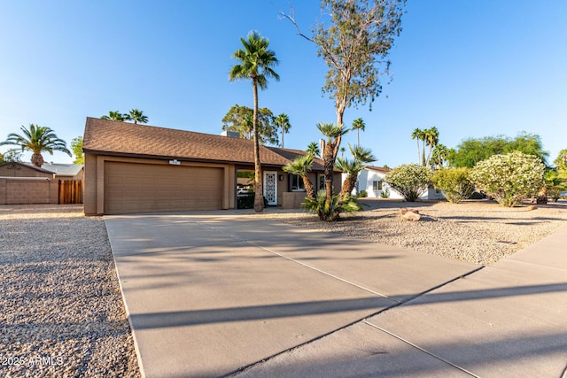 6424 E Aire Libre Ln, Scottsdale, AZ 85254 - single story home with an attached garage, concrete driveway, and stucco siding