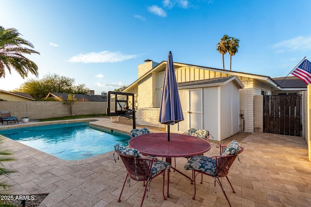 view of swimming pool featuring a patio area, a fenced in pool, and a fenced backyard