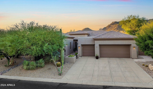 view of front of home with a garage