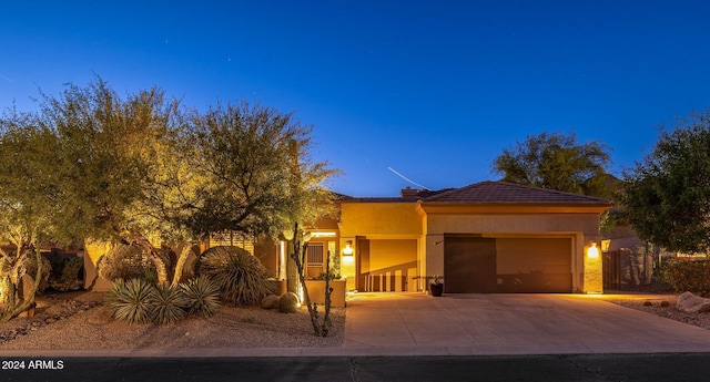 view of front of property featuring a garage