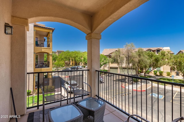 balcony featuring a residential view
