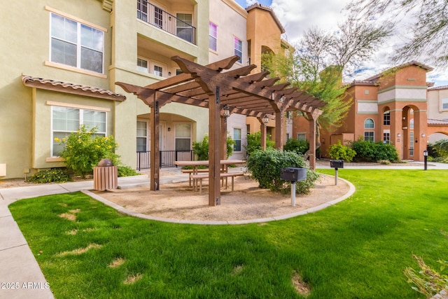 exterior space featuring a yard and a pergola