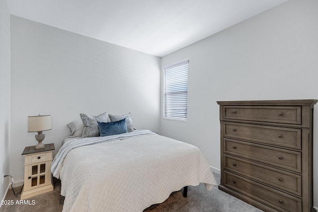 carpeted bedroom with baseboards