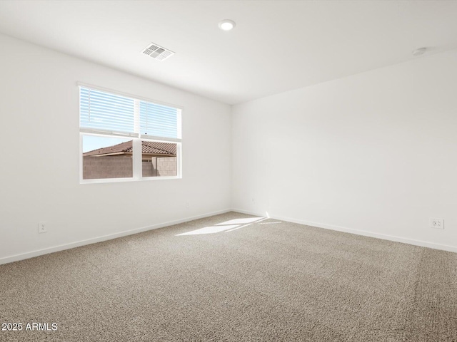 17703 W Southgate Ave, Goodyear, AZ 85338 - carpeted empty room with visible vents and baseboards