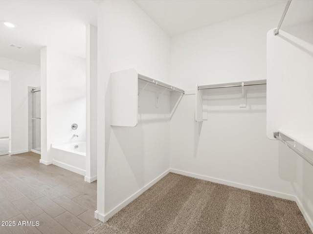 17703 W Southgate Ave, Goodyear, AZ 85338 - spacious closet with light wood-style flooring